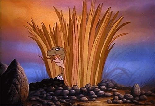oldfilmsflicker eating sleeping spike dinosaurs GIF